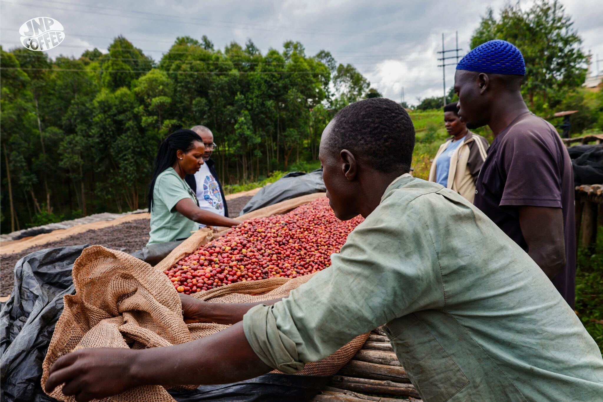 Producers from Bavyeyi Group and JNP Coffee pictured at the processing station in Burundi ©JNPCoffee