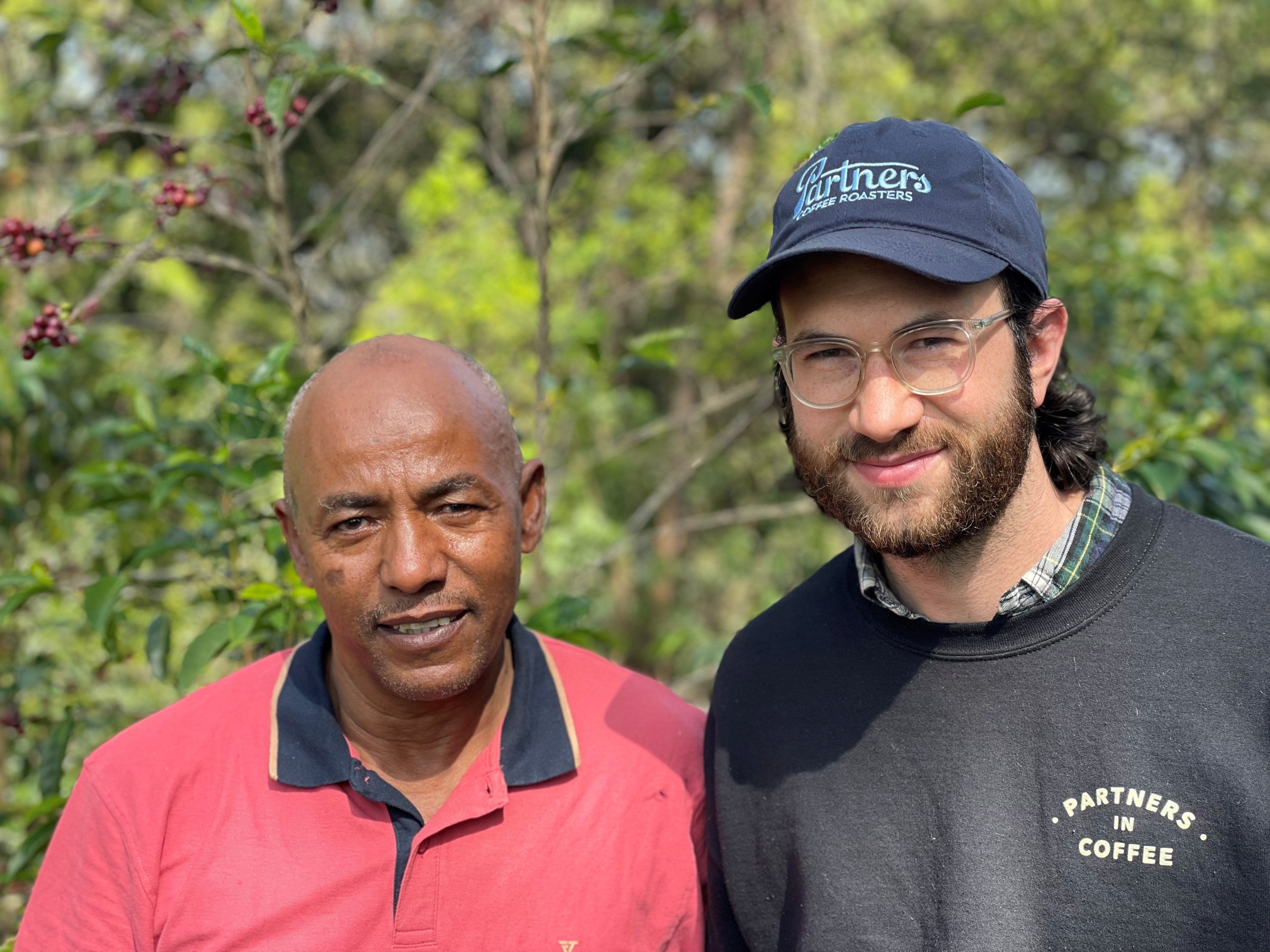 Producer Tesfaye Bekele with Partners Coffee's Green Coffee Buyer, Samuel Klein