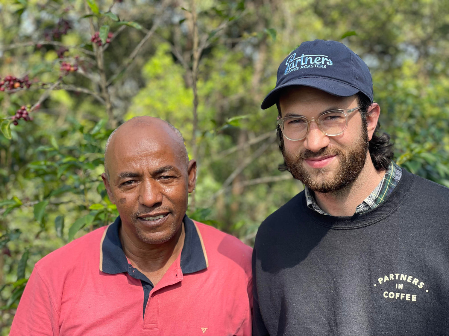 Producer Tesfaye Bekele with Partners Coffee's Green Coffee Buyer, Samuel Klein