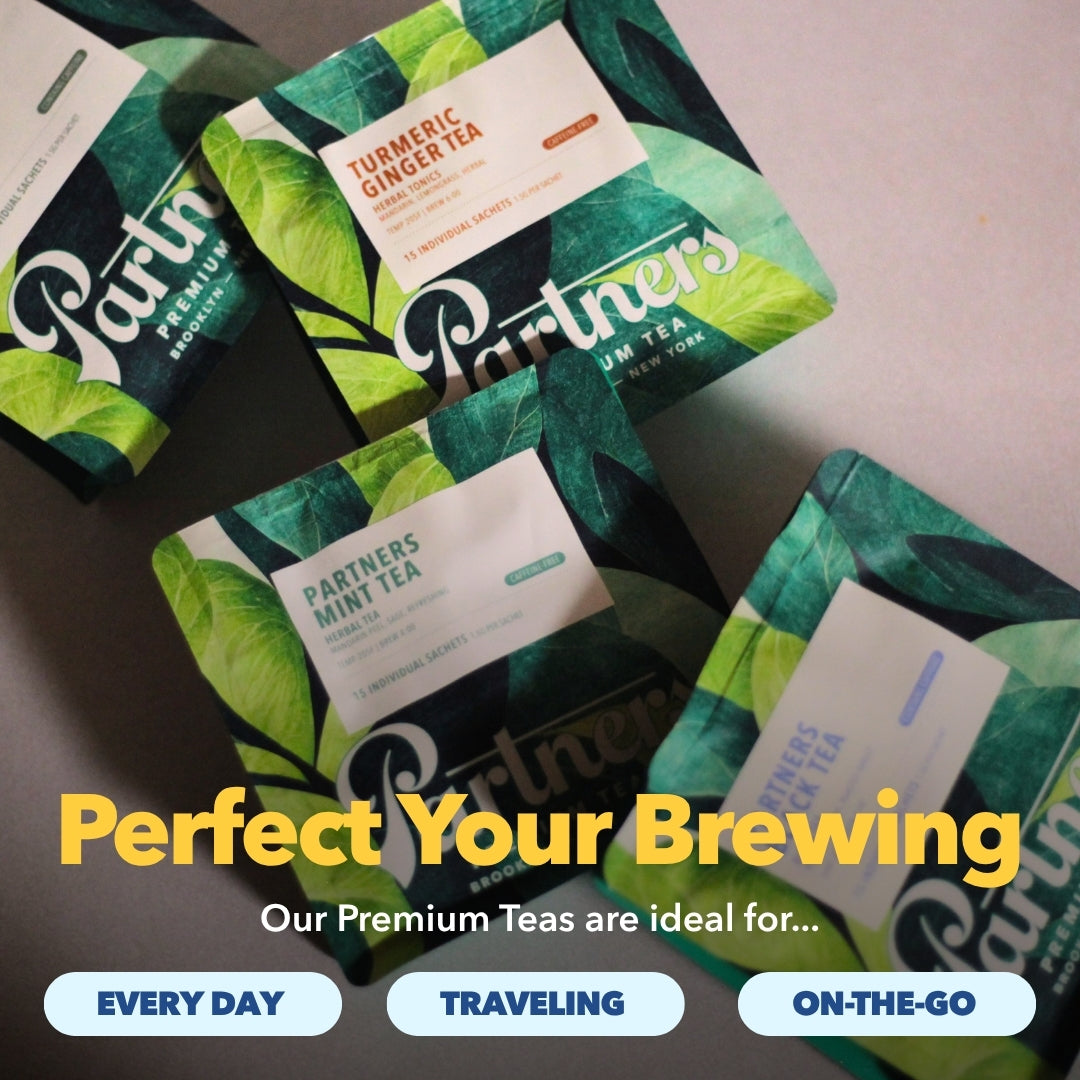 Tea packages arranged on a table with Perfect Your Brewing text and labels for every day traveling and on the go